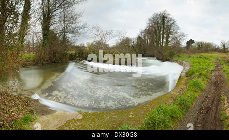Belelle river in Neda, Galicia, Spain in a cloudy day Stock Photo
