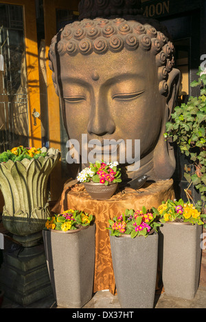Buddha figure at Antique store entrance, Vancouver, British Columbia, Canada Stock Photo