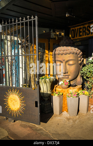 Buddha figure at Antique store entrance, Stock Photo
