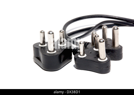 Three isolated 220 volt three pin male plugs Stock Photo
