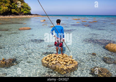 Ko Surin, Thailand. 1st Mar, 2014. HOOK, an indigenous Moken man, holds a three-pronged throwing spear and searches for fish in the waters of Ko Surin National Park. (Credit Image: © Taylor Weidman/zReportage.com via ZUMA Press) Stock Photo