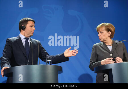 Berlin, Germany. 17th Mar, 2014. German Chancellor Angela Merkel (R) and Italy's Prime Minister Matteo Renzi attend a press conference at the Chancellery in Berlin, Germany, on Mar. 17, 2014. Merkel on Monday welcomed Italy's visiting new Prime Minister Matteo Renzi on his first official visit to Berlin for German and Italian government consultations since Renzi took office in February. Credit:  Zhang Fan/Xinhua/Alamy Live News Stock Photo