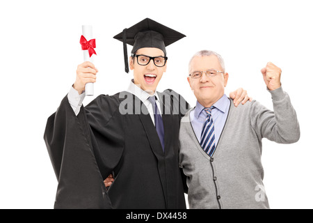 Young man and his father celebrating graduation Stock Photo