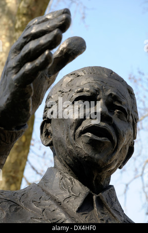 London, England, UK. Bronze statue (Ian Walters, 2007) of Nelson Mandela in Parliament Square. Stock Photo