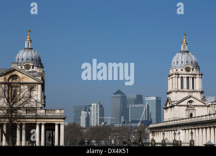 The towers of The Royal Naval College, with the skyline of Canary Wharf in the background. Stock Photo