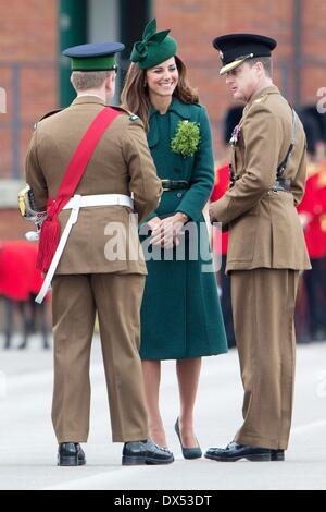 Aldershot, Great Britain. 17th Mar, 2014. Catherine, Duchess of Cambridge attends the traditional sprigs of shamrocks to the officers and Irish guards at St. Patrick's Day parade at Mons Barracks in Aldershot, Great Britain, 17 March 2014. Photo: Patrick van Katwijk/NO WIRE SERVICE/dpa/Alamy Live News Stock Photo