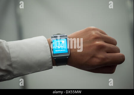 London, UK. 18 March 2014.  Galaxy Gear smartwatch by Samsung is on show at the Wearable Technology Conference at Olympia in London Credit:  Piero Cruciatti/Alamy Live News Stock Photo