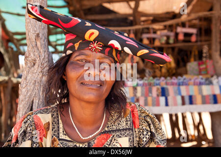 Herero woman with typical headdress, Namibia Stock Photo