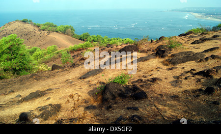 Exploring Goa India Scenic rocky cliff View and Aerial views of Goa Beach at North Goa India Stock Photo