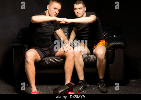 Two young boxers giving a high fives Stock Photo