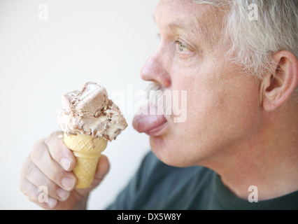 senior man ready to enjoy a cold treat Stock Photo