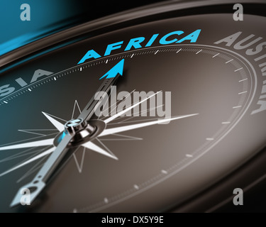 Abstract compass needle pointing the destination africa, blue and brown tones with focus on the main word. Stock Photo