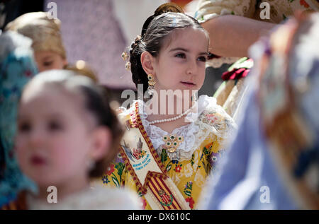 Valencia, Spain. 18th Mar, 2014. Girls in traditional costume are seen during the Fallas Festival Parade to offer bouquets to the giant sculpture of the Virgin in Valencia, Spain, March. 18, 2014. The Fallas is a traditional celebration held in commemoration of Saint Joseph in the city of Valencia, in Spain. Credit:  Xinhua/Alamy Live News Stock Photo