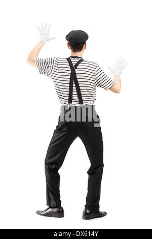 Full length portrait of a mime artist performing Stock Photo