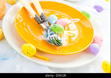 Closeup of Easter place setting with eggs Stock Photo
