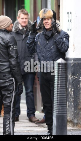 Bruce Willis filming scenes for the new movie 'Red 2' off Hatton Garden, a side street is turned into Moscow for the filming. London, England - 27.10.12 Featuring: Bruce Willis Where: London, United Kingdom When: 27 Oct 2012 Stock Photo