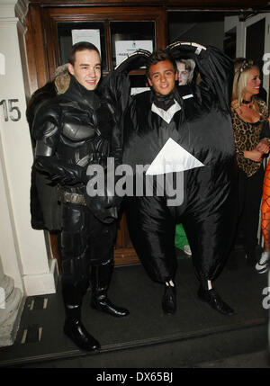 Liam Payne of One Direction dressed as Batman and Tom Daley in a fat skeleton costume Celebrities at Funky Buddha nightclub for a Halloween party London, England - 28.10.12 Where: London, United Kingdom When: 27 Oct 2012 Stock Photo