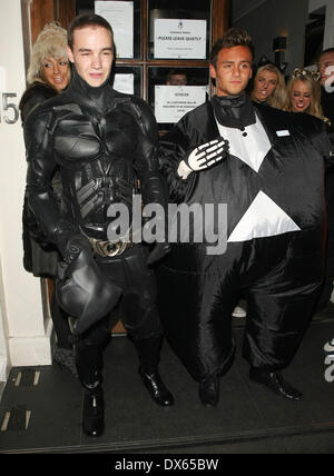 Liam Payne of One Direction dressed as Batman and Tom Daley in a fat skeleton costume Celebrities at Funky Buddha nightclub for a Halloween party London, England - 28.10.12 Where: London, United Kingdom When: 27 Oct 2012 Stock Photo