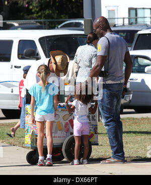 Seal enjoys a day with his children, Leni Samuel, Henry Samuel, Johan Samuel and Lou Samuel at Children's football & American football practice session in Brentwood. Featuring: Seal Where: California, United States When: 27 Oct 2012 Stock Photo