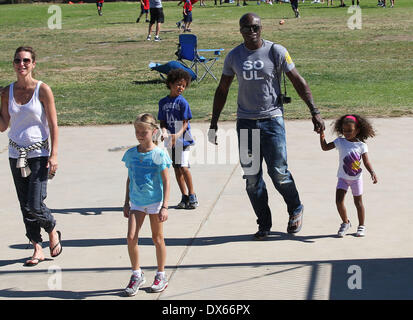 Seal enjoys a day with his children, Leni Samuel, Henry Samuel, Johan Samuel and Lou Samuel at Children's football & American football practice session in Brentwood. Featuring: Seal Where: California, United States When: 27 Oct 2012 Stock Photo