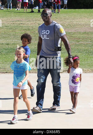 Seal enjoys a day with his children, Leni Samuel, Henry Samuel, Johan Samuel and Lou Samuel at Children's football & American football practice session in Brentwood. Featuring: Seal Where: California, United States When: 27 Oct 2012 Stock Photo