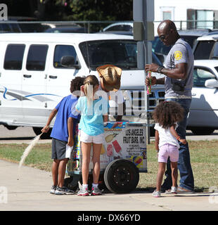 Seal enjoys a day with his children, Leni Samuel, Henry Samuel, Johan Samuel and Lou Samuel at Children's football & American football practice session in Brentwood. Featuring: Seal Where: California, United States When: 27 Oct 2012 Stock Photo