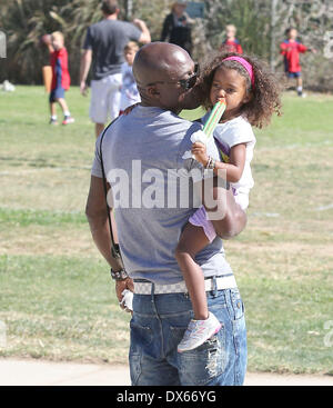 Seal enjoys a day with his children, Leni Samuel, Henry Samuel, Johan Samuel and Lou Samuel at Children's football & American football practice session in Brentwood. Featuring: Seal Where: California, United States When: 27 Oct 2012 Stock Photo