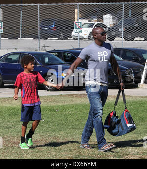 Seal enjoys a day with his children, Leni Samuel, Henry Samuel, Johan Samuel and Lou Samuel at Children's football & American football practice session in Brentwood. Featuring: Seal Where: California, United States When: 27 Oct 2012 Stock Photo