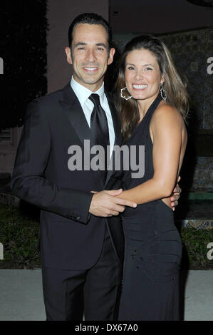 Helio Castroneves and Adriana Henao arrives at 23rd Annual Chris Evert/Raymond James Pro-Celebrity Tennis Classic Gala at Boca Raton Resort Featuring: Helio Castroneves and Adriana Henao Where: Florida, FL, United States When: 27 Oct 2012 Stock Photo