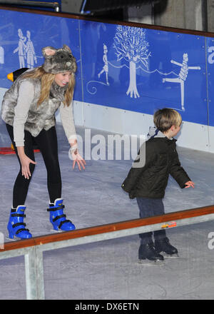 Stacey Solomon and son, Zachary Natural History Museum Ice Rink launch party - Inside London, England - 01.11.12 Featuring: Sta Stock Photo