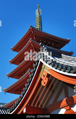 Traditional wooden roof and pagoda at the Shinto Shrine at Senso-Ji Buddhist Temple in Asakusa in Tokyo, Japan Stock Photo
