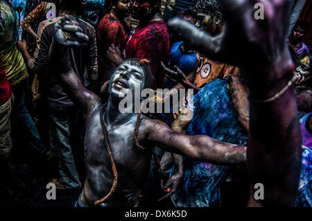 Dhaka, Bangladesh. 16th Mar, 2014. The colorful festival of Holi is celebrated on Phalgun Purnima which comes in February end or early March. Holi festival has an ancient origin and celebrates the triumph of 'good' over 'bad'. The colorful festival bridges the social gap and renew sweet relationships. On this day, people hug and wish each other 'Happy Holi'. In Bangladesh Holi is celebrated in Shakhari Bazar for many years. People from all religion and area come here to enjoy the day and to make the festival more colorful. © Anik Rahman/NurPhoto/ZUMAPRESS.com/Alamy Live News Stock Photo