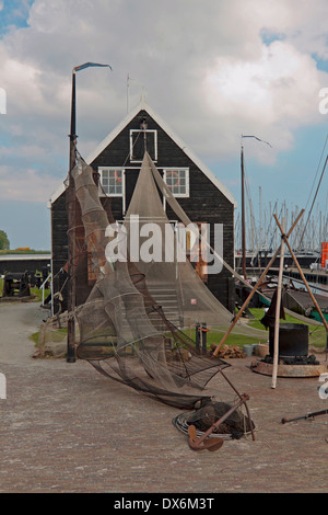 Fishing net hanging to dry near the sea in Croatia Stock Photo - Alamy