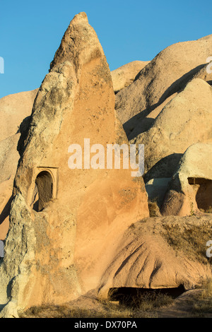 Window in fairy chimney, Red Valley, Cappadocia, Turkey Stock Photo
