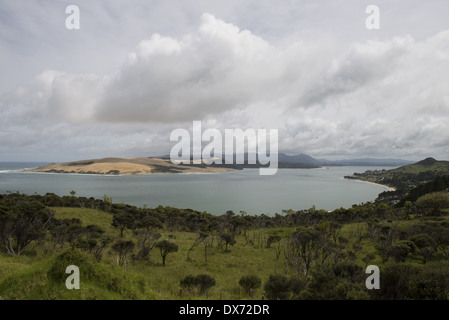 South Head at the entrance to Hokianga Harbour. Looking north across the entrance to the giant sand dunes on North Head. Stock Photo