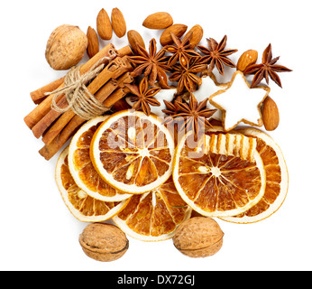 christmas cookies with cinnamon sticks, anise stars, nuts and sliced of dried orange Stock Photo