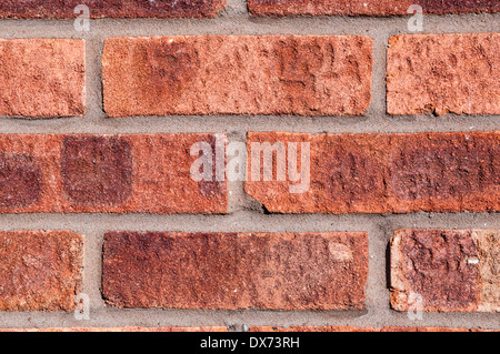 Red brick wall with grey pointing, landscape, close. Stock Photo