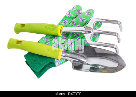 Garden gloves, trowel and hand rake on white. Stock Photo