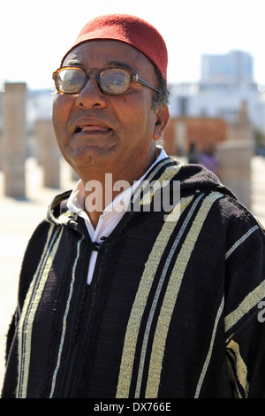 Moroccan man wearing a fez in the city of Rabat Morocco Stock Photo