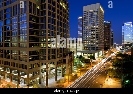 Long exposure photo of the a city street in downtown Phoenix, Arizona at night. Stock Photo