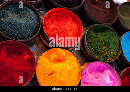 A market stall near Cuzco, Peru, South America. Tins of multicolored vegetable dyes and paints. Stock Photo