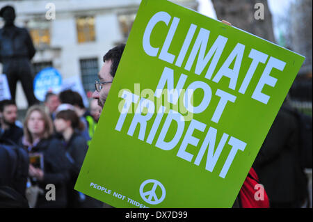 London, UK . 19th Mar, 2014. Around 50 protesters staged what they called the Peoples Budget opposite Downing St in London. Credit:  graham mitchell/Alamy Live News Stock Photo