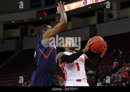 Boston University guard Maurice Watson Jr. (1) goes to the basket ...