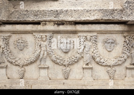 Carved stone detail on a sarcophagus at The Catacombs of Kom El Shuqafa, Alexandria, Egypt Stock Photo