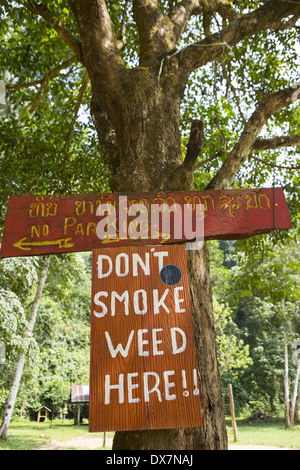 Public Notice in Vang Vieng, Laos 'Don't Smoke weed Here!' Stock Photo