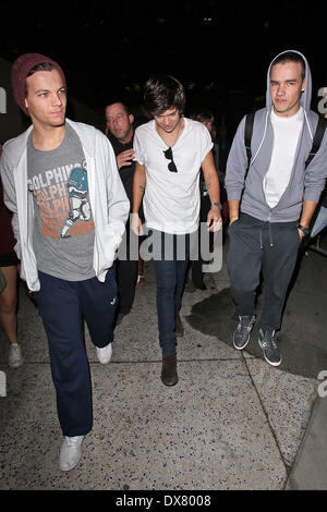 Louis Tomlinson and Harry Styles, of One Direction seen arriving at LAX  airport. Los Angeles California - 06.11.12 Featuring: L Stock Photo - Alamy