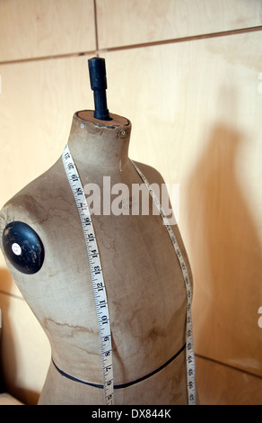 Dressmakers Doll and Measuring Tape Stock Photo