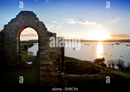 Dawn breaks over the flooded fields of the Somerset Levels from Burrow Mump near Burrowbridge UK Feb 2014 Stock Photo