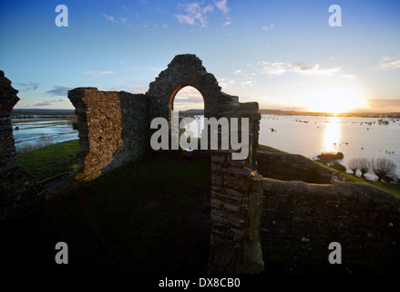 Dawn breaks over the flooded fields of the Somerset Levels from Burrow Mump near Burrowbridge UK Feb 2014 Stock Photo
