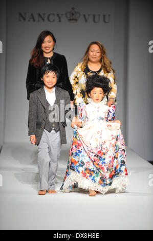 LOS ANGELES, CA - MARCH 10: Designers and child models walk the runway at Nancy Vuu Children during Style Fashion Week Fall 2014 on March 10, 2014 in Los Angeles. Stock Photo